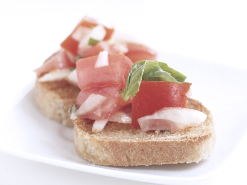 Diced tomato, olive oil, garlic and fresh basil on toast